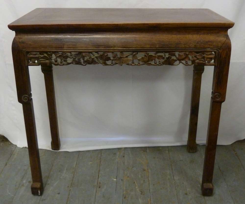 Chinese rectangular hardwood side table with pierced and carved leaf band on four rectangular legs