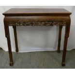 Chinese rectangular hardwood side table with pierced and carved leaf band on four rectangular legs