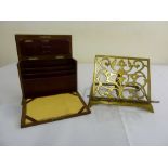 A mahogany stationary box and brass book stand with hinged back