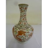 Chinese baluster vase decorated with dragons chasing a flaming pearl and stylised clouds