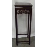 Chinese rectangular hardwood stand, scroll pierced band all on four moulded rectangular legs