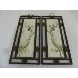 A pair of Chinese Republic period porcelain panels of birds in a almond tree, in hardwood frame