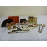 A quantity of collectable items to include opera glasses, salad servers, silver handled button