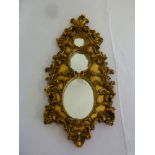 Decorative gilded wall mirror