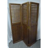 Three panel oak screen, hinged with lattice top