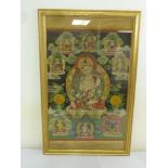 A Tibetan tanka framed and glazed depicting various deities - 69 x 47.5cm