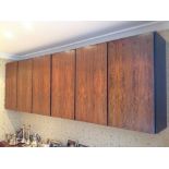 Pair of Rosewood wall hanging cabinets with push release doors, glass and wood shelves