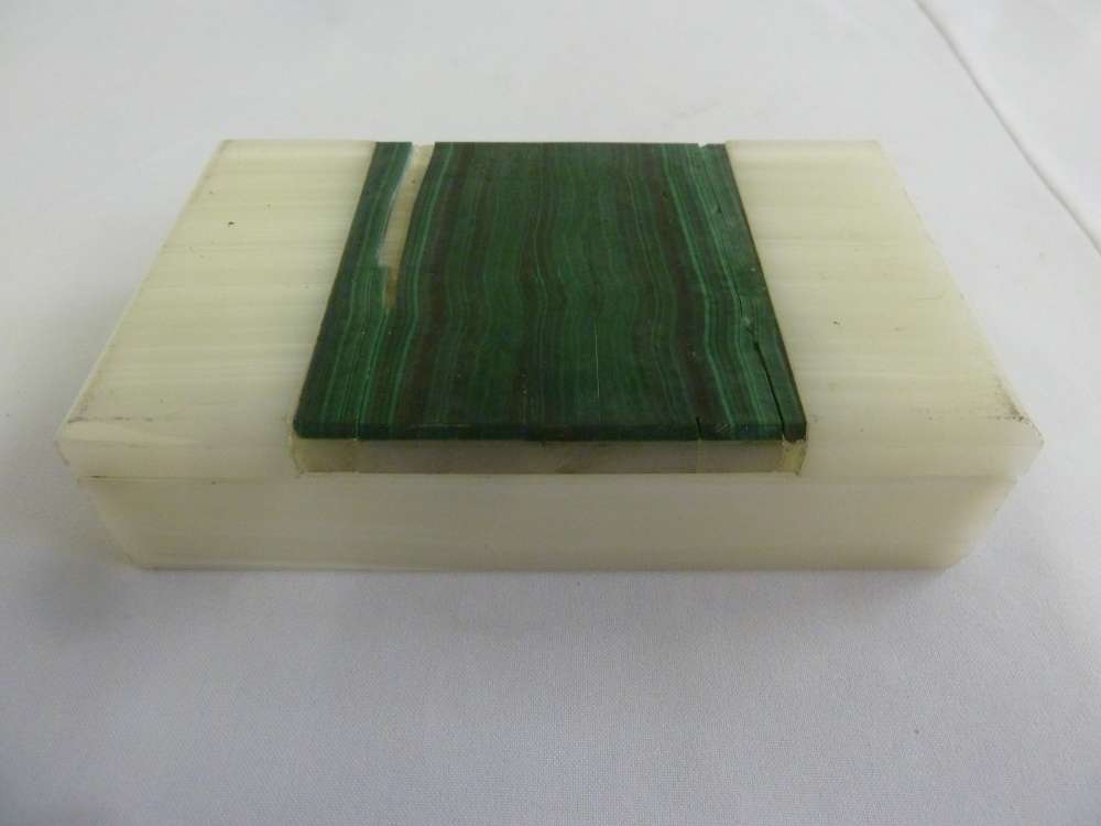 A rectangular white onyx cigarette box, the hinged cover set with malachite - A/F