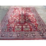 Oriental wool carpet with repeating mogul design and red ground - 360 x 271cm