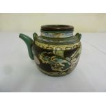 Chinese terracotta teapot decorated with dragons and stylised clouds