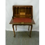 Early 20th century walnut veneered writing bureau on cabriole legs