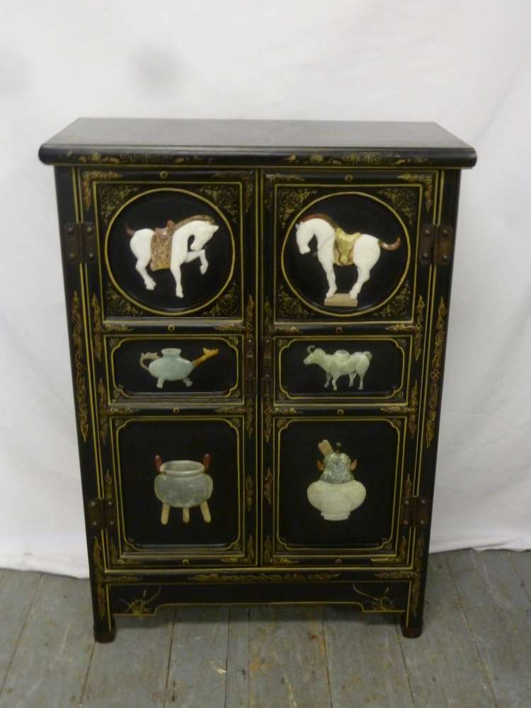 Oriental cabinet with hardstone decoration applied to the six panelled doors