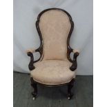 Victorian ladies upholstered mahogany armchair with original castors