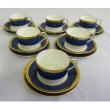 Coalport tea set blue ground with gilded border, six cups, saucers and plates