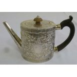 A George III silver drum teapot by Charles Wright of London 1776, the sides and hinged cover later