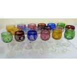 A quantity of long stem coloured cut glass hock glasses (24)