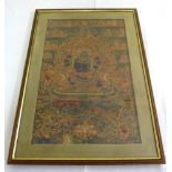 A 19th century Tibetan framed and glazed silk Tanka - 57 x 36cm