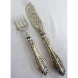 A pair of Victorian silver fish carvers scroll pierced blades, Birmingham 1864