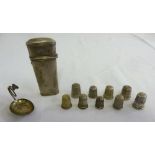 A quantity of silver and white metal to include an Etui, a caddy spoon and nine thimbles