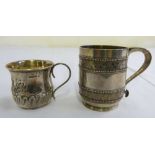 A Victorian silver mug cylindrical with engraved floral bands between beaded borders, London 1872