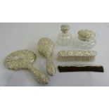 Six piece silver dressing table set comprising hand mirror, hair brush, clothes brush, comb and