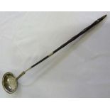 A George III silver toddy ladle with coin set to the bowl and twisted whalebone handle