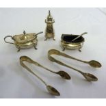 Three piece silver condiment set, two condiment spoons and two pairs of sugar tongs