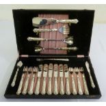 Cased set of Kings Pattern fish eaters with silver handles