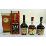 A quantity of whisky and brandy to include Hennessy, Courvoisier and VAT 69