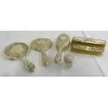 Six silver mounted dressing table pieces to include two hand mirrors, a hairbrush, two clothes