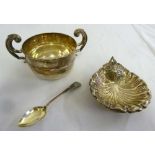 Silver shell dish, silver porringer and a silver spoon