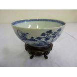 Chinese Nanking blue and white bowl on carved hardwood stand, label to base - A/F