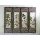 Four Famile Rose porcelain hand painted panels in hardwood frames with brass handles