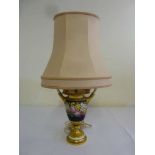 Porcelain table lamp with gilded handles and silk shade