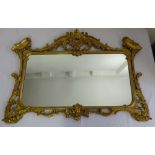 Gilded shaped rectangular wall mirror in Rococo style