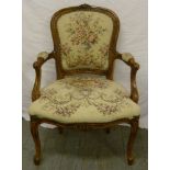 Mahogany upholstered armchair on cabriole legs