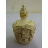 Oriental carved ivory snuff bottle circa 1900, signed to the base