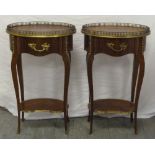 Pair of Louis XVI style Kingswood oval side tables with brass galleries and brass handles to the