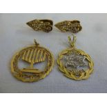 Two gold pendants and a pair of earrings (tested 14ct), approx 9.8g