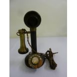 A 1920s candlestick telephone