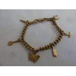 9ct gold charm bracelet with six charms, approx 15.8g