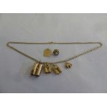 9ct gold chain and six gold pendants, approx 25g