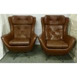 Pair of 1960s leather swivel egg chairs