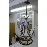 A 19th century brass chandelier, two branches flanked by rampant lion and with central glass bowl