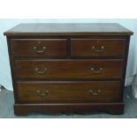 Mahogany chest of drawers with four drawers and brass handles on bracket feet and castors