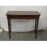 George III mahogany card table on four turned legs, A/F