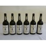 Six 75cl bottles of Warres 1975 Vintage Port