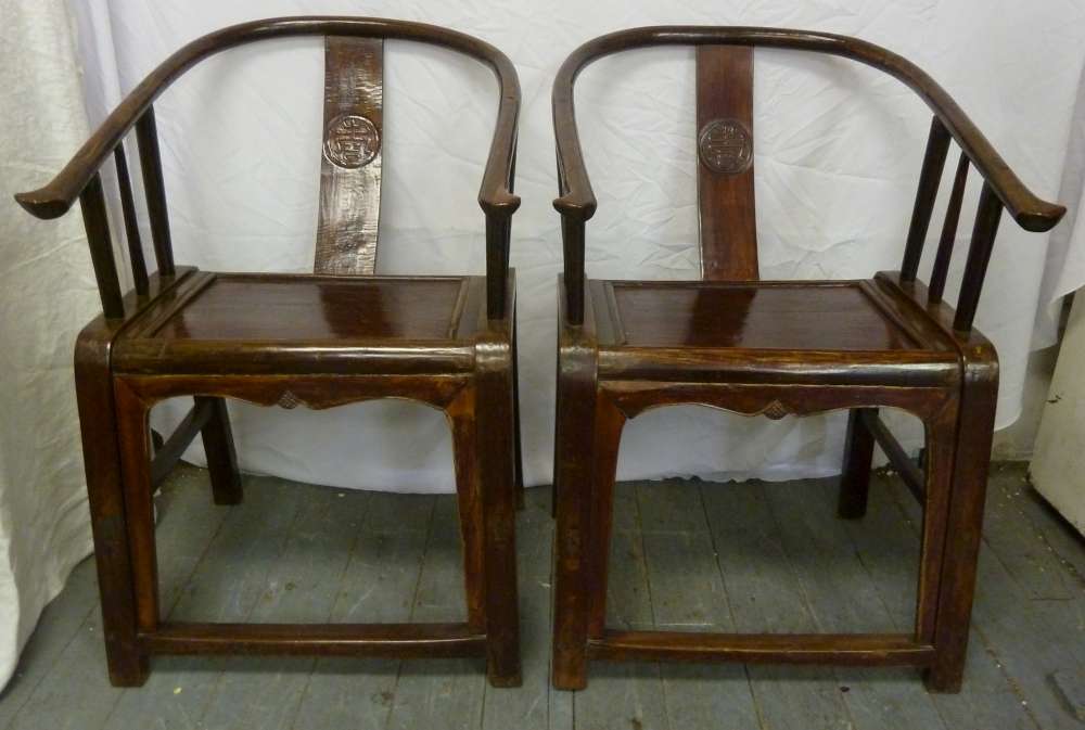 Pair of Chinese hardwood occasional chairs on moulded rectangular legs