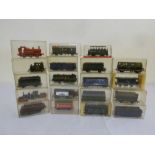 A quantity of kit built locos and wagons in Perspex boxes, fourteen wagons and three Locos, all in