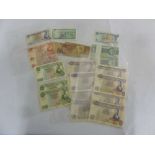 A quantity of foreign banknotes to include Mauritius 50 Rupees x 8, Mauritius 10 Rupees x 2,
